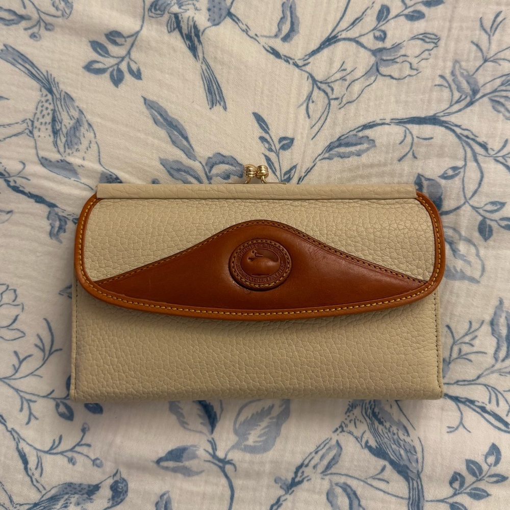 dooney and bourke all weather leather vintage kisslock wallet cream and brown